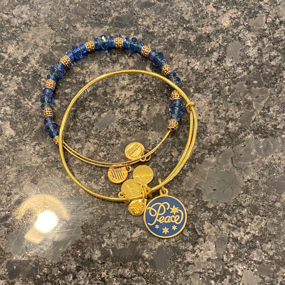 Gold Tone Peace Charm Bangle Bracelet Set with Blue Beads